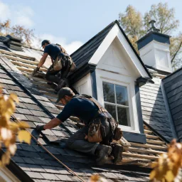 Residential roof installation in progress on a clean Denver-area home